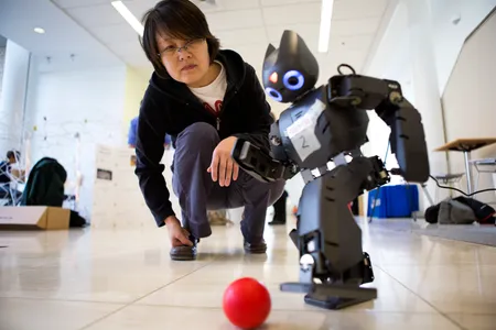 A robot playing soccer.