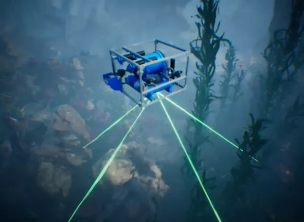 A roboticist presenting to a group of students.