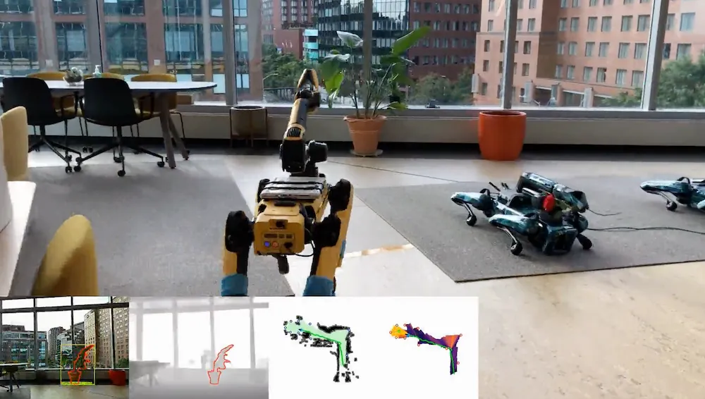 A Spot mobile manipulator in an office setting