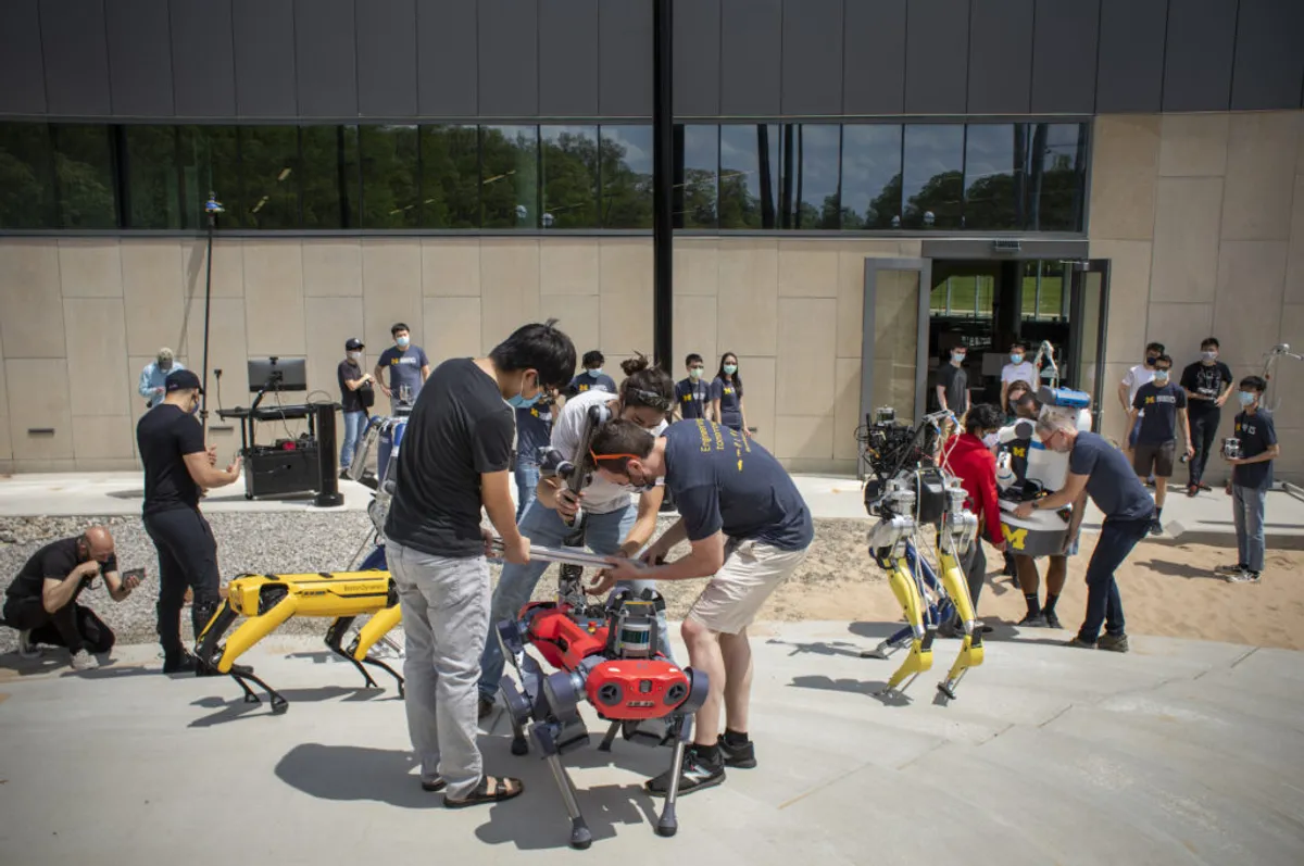 Students wrangle a vareity of robots on the robot playground