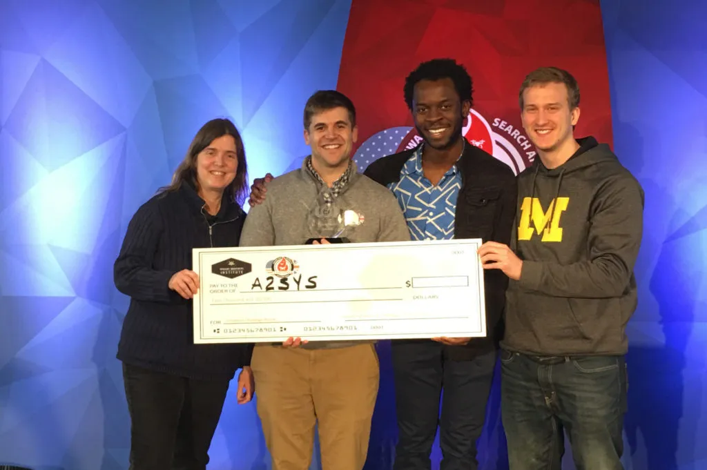 A2Sys Lab poses with award money