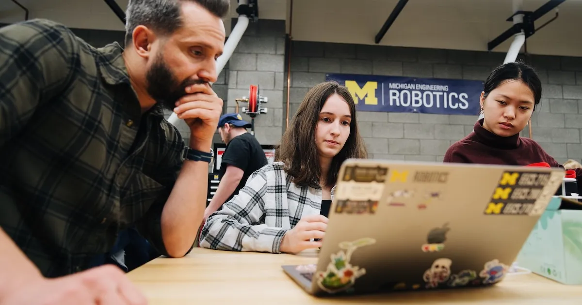 Students studying in the Robotics Building atrium