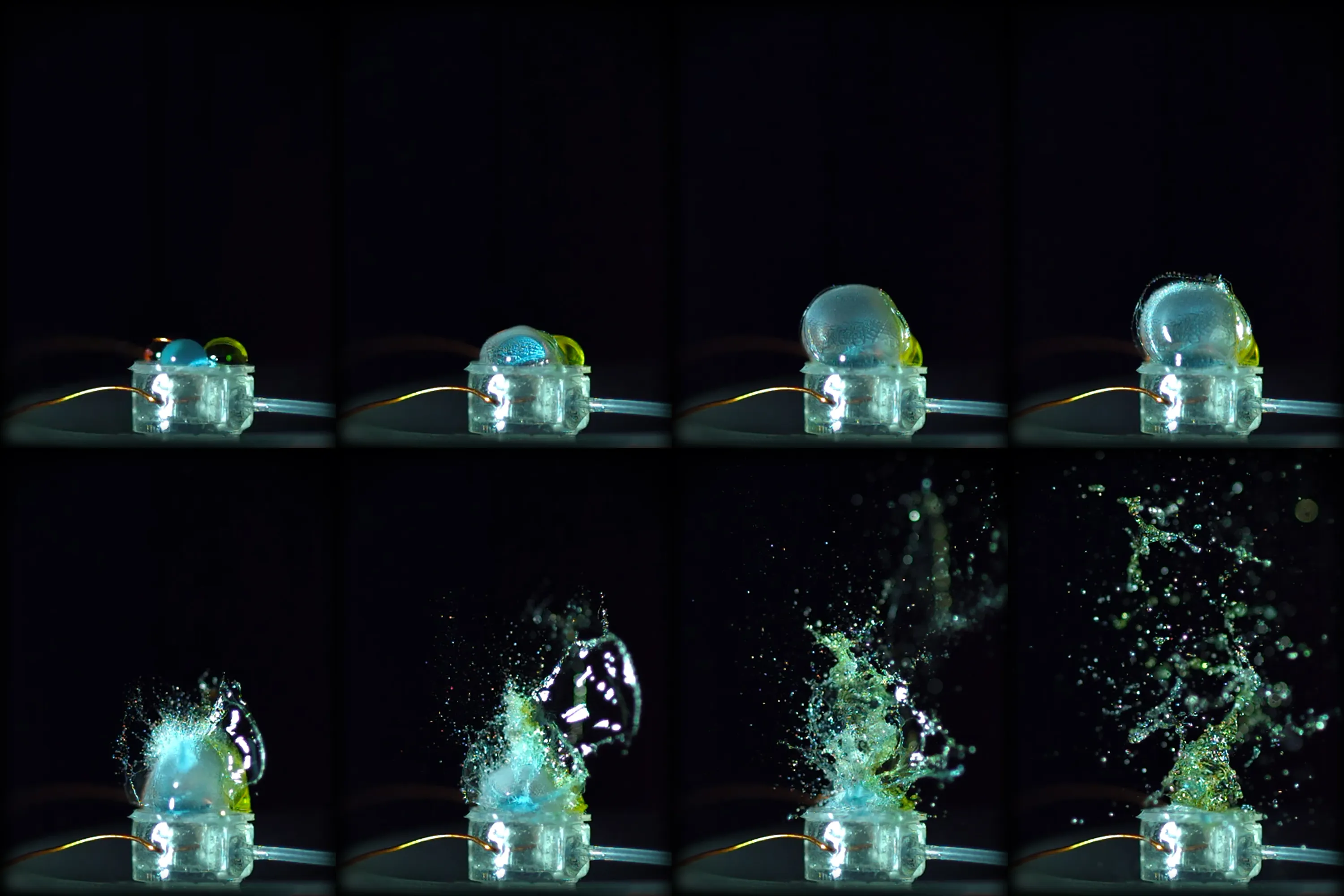 "Spark of Color." A tiny controlled explosion inflates the soft membrane of a microcombustion actuator, sending colorful water droplets skyward.