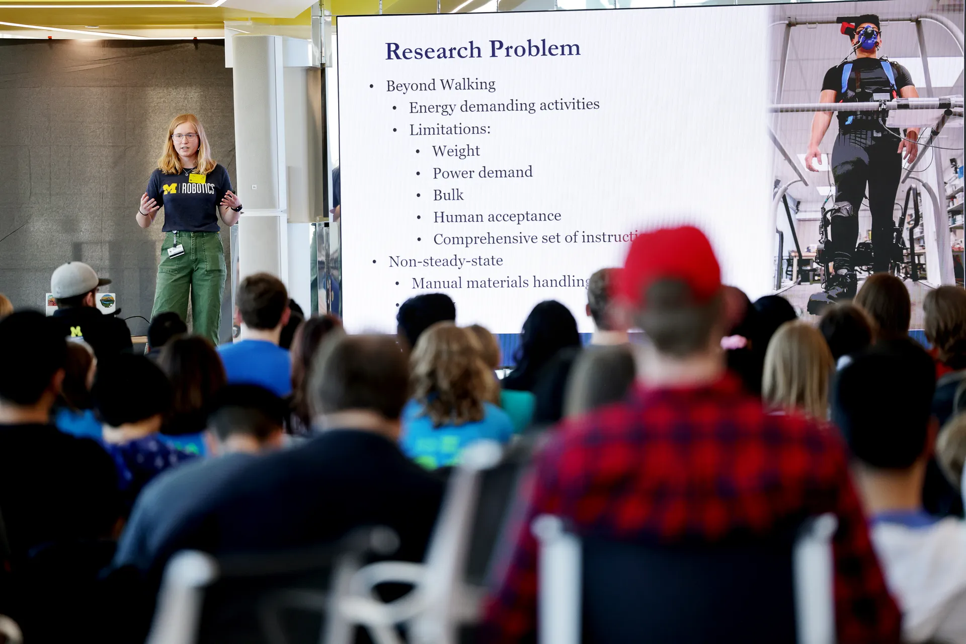 A presentation in the atrium of the Ford Robotics Building