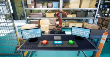 A simulated warehouse environment shows a red robotic arm picking boxes from shelves above a control console with a serial-number display, score and timer monitors, and red, blue, and green buttons used by a human operator.