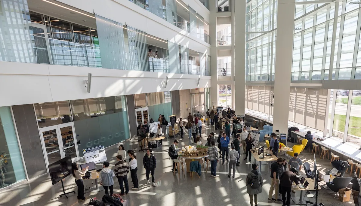 A wide shot of the ROB 450 Capstone Expo, held at the Ford Robotics Building